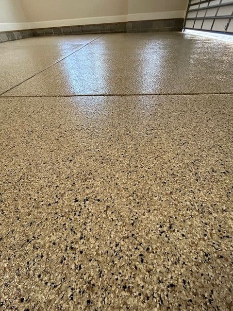 Triangle Superior tan-flake garage epoxy close-up
